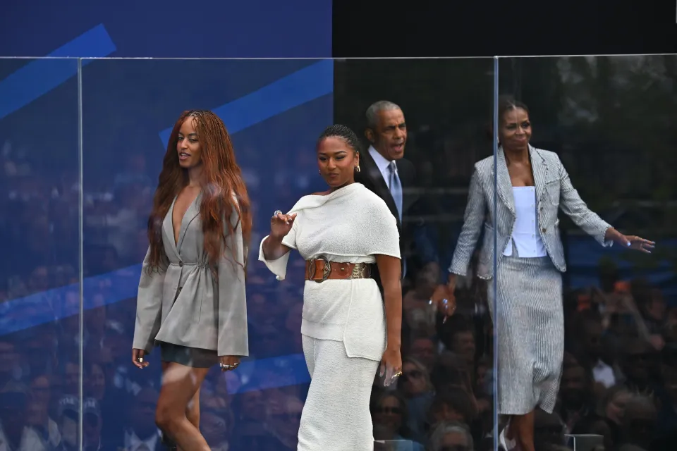 Malia and Sasha Reunite with Parents for Rare Public Appearance at Obama Center Opening